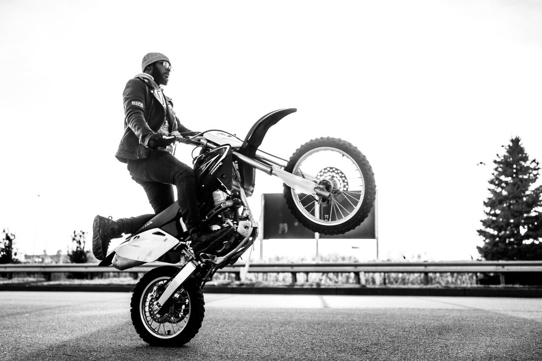Black and white wheelie silhouette