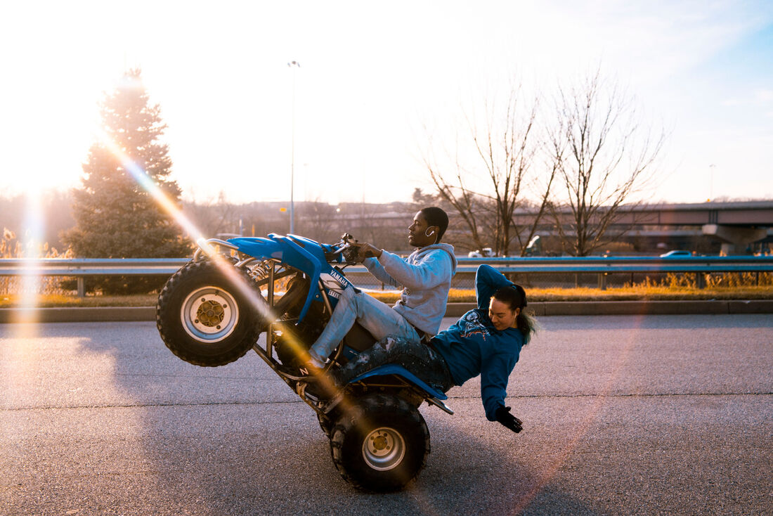 ATV wheelie at sunset, Baltimore